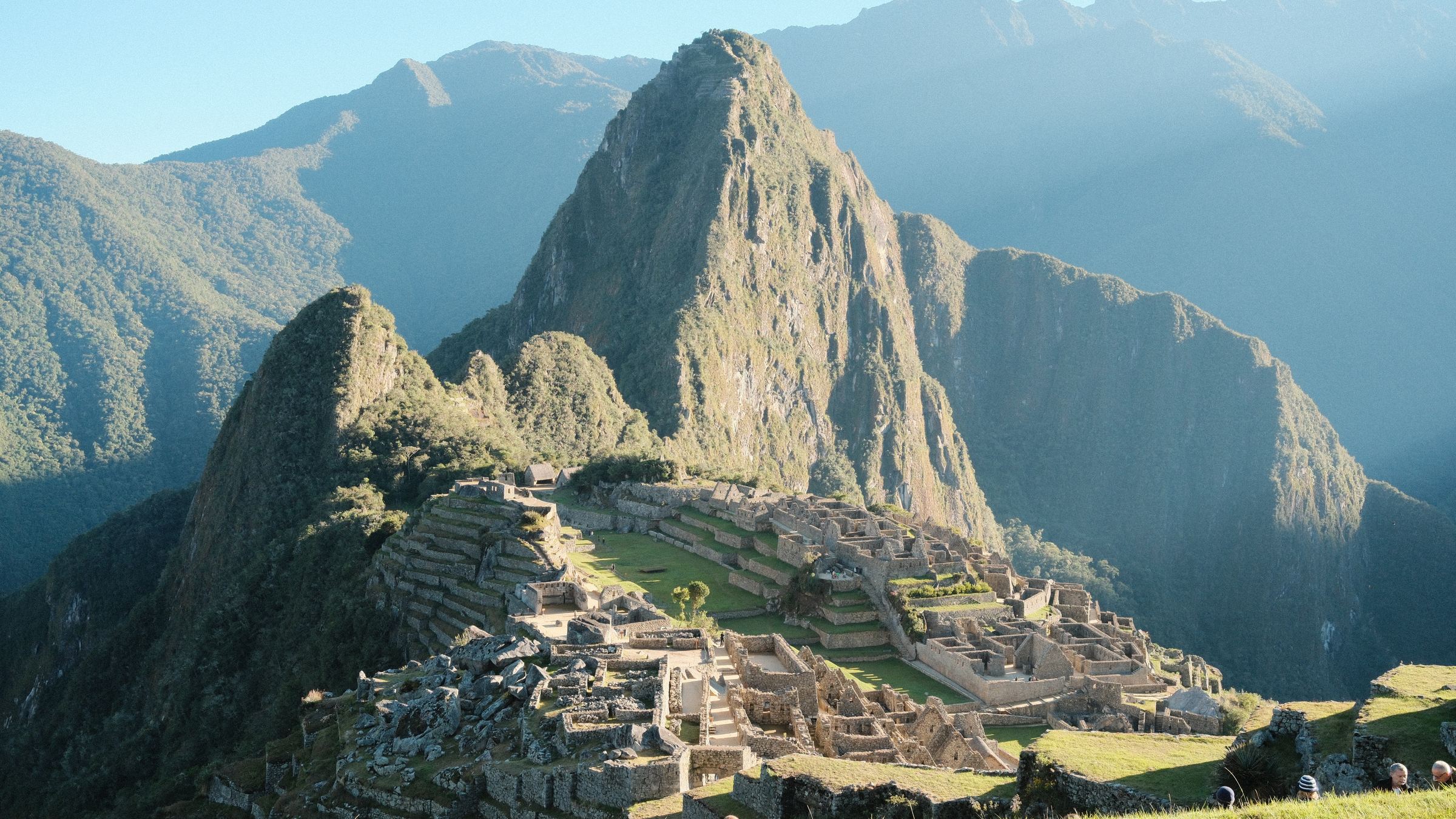 Sunrise view of Machu Picchu and Huayna Picchu peak in the Peruvian Andes